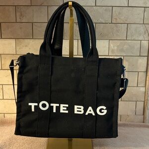 Black Canvas Tote Bag with White 'TOTE BAG lettering’